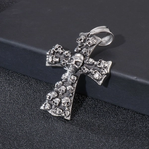 Silver skull cross pendant necklace for men in punk street style on a black gift box