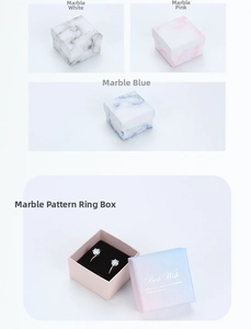 Detail of marble pattern jewelry boxes in white, pink and blue with Best Wish gold foil