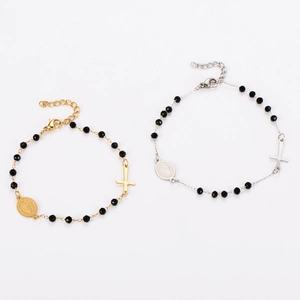 Vintage stainless steel beaded bracelet with black beads and religious cross pendant