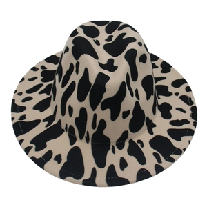 Adult cow print felt fedora hat in ivory and black with wide brim and jazz style