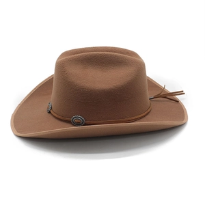 Detail of brown felt cowboy hat with vintage silver conchos and leather fringe tassels
