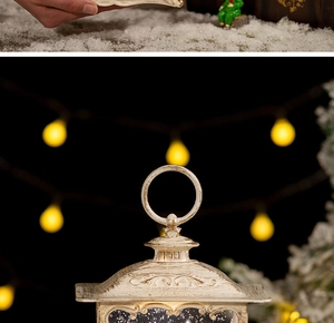 Macro detail of vintage Christmas lantern with glitter water and warm yellow light