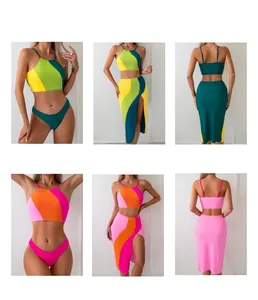 Detailed views of a three-piece color-block swimsuit with high-slit skirt and tank top