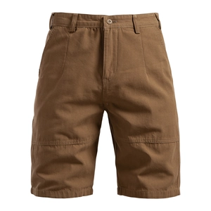 Close-up of cotton cargo shorts showing metal button, zipper fly and durable canvas texture