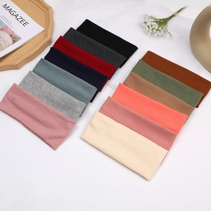 Set of 12 multi-colored ribbed knit headbands made of high-elasticity cotton blend fabric