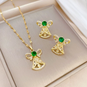 Elegant gold bell jewelry set with green gemstones and sparkling zircon accents