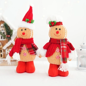 Detail of gingerbread plush ornaments with knit textures and festive Christmas attire