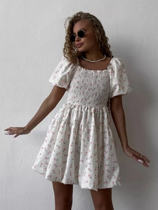 Floral square neck puff sleeve mini dress with smocked waist and ruffled hem details