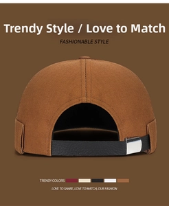 Detail of adjustable leather strap and metal buckle on back of embroidery docker hat