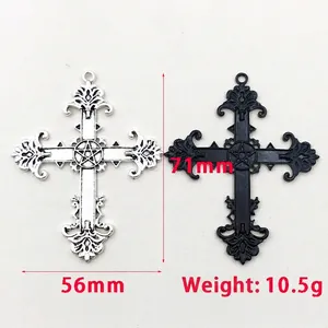 Gothic style silver and black oil drip cross pendant set with pentagram engraving
