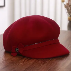 Vintage wool newsboy cap in burgundy with elegant floral detail and sequin band