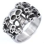 Macro shot of punk gothic silver skull ring with vintage oxidized finish and hollow details