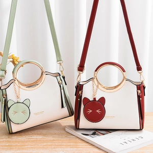 Green and red PU leather shoulder bags with metal handles and cute cat coin purses