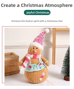 Close-up of a handmade knitted gingerbread man ornament with sequined hat and scarf