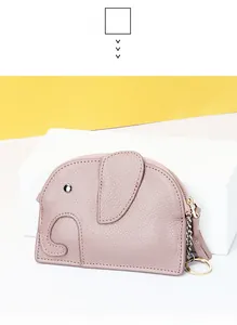 Detail of pink elephant coin purse featuring litchi grain leather and silver rivet eye