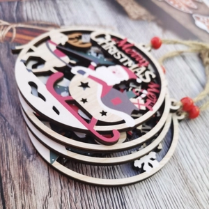 Hollow round wooden Christmas ornament with Santa Claus sled and red beads