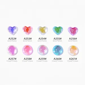 Colorful aurora nail art charms in heart and round shapes with gradient resin finish