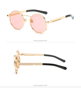 Detail view of steampunk sunglasses with spring metal temples and light pink lenses