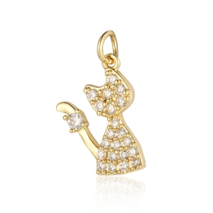 Detailed close-up of a golden cat pendant featuring sparkling clear cubic zirconia stones