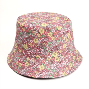 Close-up of floral print bucket hat with pink, yellow and purple flower patterns