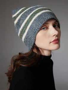 Close-up of the soft gray wool knit texture with green and white stripe details