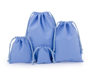 Set of four light blue cotton drawstring bags in various sizes for eco-friendly storage