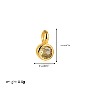 Detail showing 18K gold charm with 11mm height and 6mm width dimensions and weight