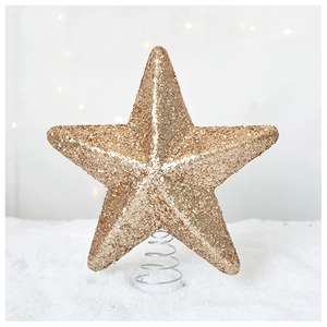 Detailed view of a gold glitter star Christmas tree topper with metal spring base