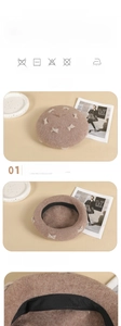 Detail view of the beige wool beret featuring delicate white bow accents and soft lining
