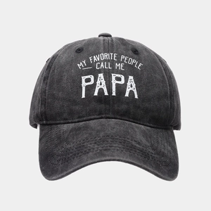 Detail of dark grey washed denim baseball cap with My Favorite People Call Me Papa text