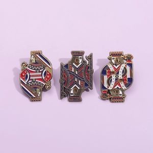 Cartoon poker card enamel pins featuring King and Queen characters in red, blue and gold