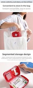 Detail of red first aid kit with internal compartments for organized medical storage