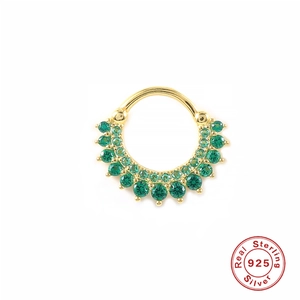 Detailed close-up of 925 sterling silver gold nose ring with emerald green gemstones
