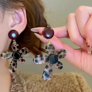 Retro leopard print flower dangle earrings with acetate petals and silver needle studs