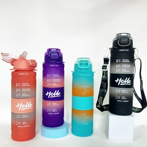 Close-up of four colorful gradient 1000ml sports water bottles with time markers and straps