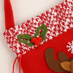 Christmas stocking candy bag with reindeer antlers and snowflake knit details
