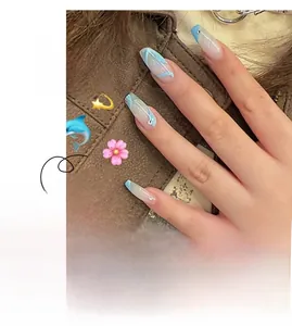 Detail of light blue abstract water-ripple press-on nails with micro rhinestones