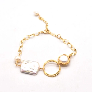 Baroque freshwater pearl bracelet with gold chain and unique twisted metal wire design