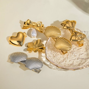 Collection of 18k gold and silver stainless steel bow, heart and floral hair clips