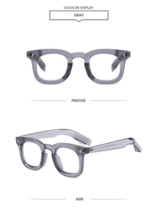 Detail view showing gray transparent retro round frames with silver diamond-shaped rivets