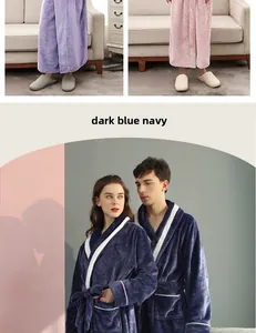 Detail of navy blue thick flannel bathrobe with contrasting white trim and waist tie strap