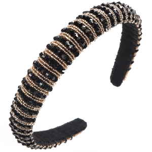 Detail of baroque headband with hand-sewn black crystals and gold beaded metal chains