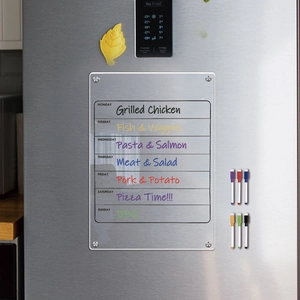 Clear acrylic weekly planner board on fridge with six colorful magnetic dry erase markers