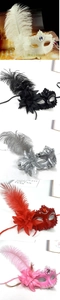 Detailed shot of party masks with soft ostrich feathers, lace trim and floral accents