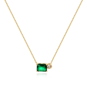 Minimalist gold necklace featuring rectangular green and round clear crystal pendants