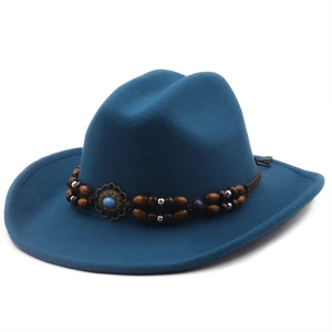 Detail of teal wool fedora showing the double-layered beaded band and vintage bronze buckle