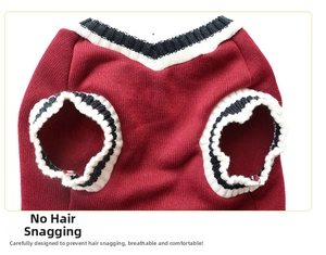 Detailed close-up of dark red knitted pet vest with striped ribbed neckline and fine stitching