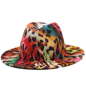Detail of colorful leopard print fedora hat with vibrant patterns and structured brim