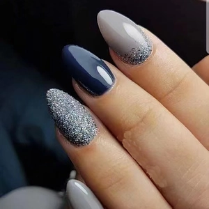 Chic long almond press-on nails with grey, dark blue, and silver glitter gradient