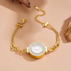 Elegant gold-tone ladies watch bracelet with rhinestone bezel and double-layer chain design